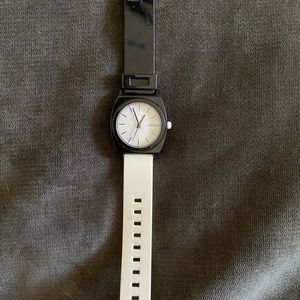 Black and white Nixon watch. Unisex.
